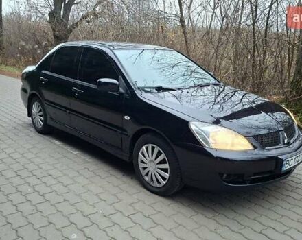 Черный Мицубиси Лансер, объемом двигателя 1.58 л и пробегом 246 тыс. км за 4200 $, фото 8 на Automoto.ua