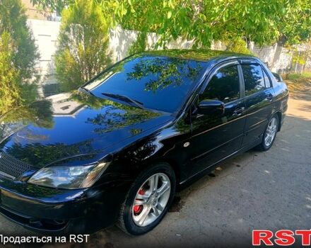 Чорний Міцубісі Lancer, об'ємом двигуна 2 л та пробігом 173 тис. км за 5200 $, фото 2 на Automoto.ua