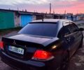 Черный Мицубиси Лансер, объемом двигателя 1.6 л и пробегом 240 тыс. км за 3900 $, фото 4 на Automoto.ua