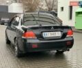 Чорний Міцубісі Lancer, об'ємом двигуна 1.58 л та пробігом 270 тис. км за 3950 $, фото 2 на Automoto.ua