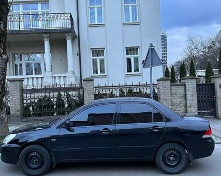 Черный Мицубиси Лансер, объемом двигателя 1.6 л и пробегом 306 тыс. км за 4800 $, фото 5 на Automoto.ua