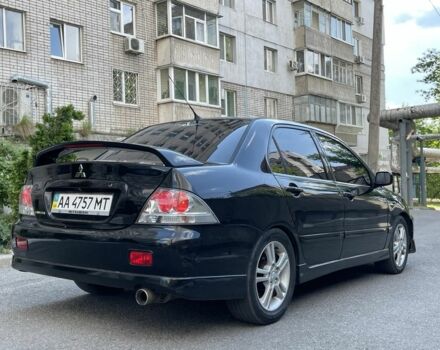 Чорний Міцубісі Lancer, об'ємом двигуна 2 л та пробігом 160 тис. км за 5000 $, фото 5 на Automoto.ua