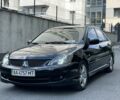 Чорний Міцубісі Lancer, об'ємом двигуна 2 л та пробігом 160 тис. км за 5000 $, фото 1 на Automoto.ua