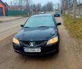 Чорний Міцубісі Lancer, об'ємом двигуна 1.6 л та пробігом 313 тис. км за 2450 $, фото 1 на Automoto.ua