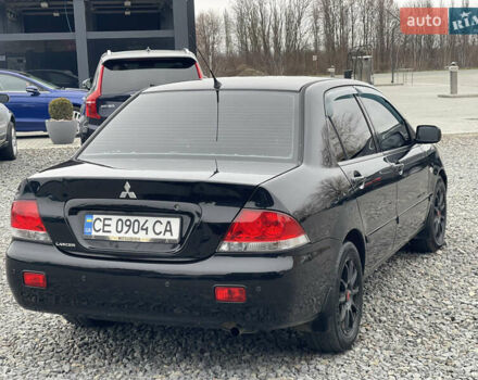 Чорний Міцубісі Lancer, об'ємом двигуна 1.58 л та пробігом 230 тис. км за 3350 $, фото 8 на Automoto.ua