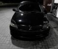 Чорний Міцубісі Lancer, об'ємом двигуна 2 л та пробігом 300 тис. км за 4100 $, фото 1 на Automoto.ua