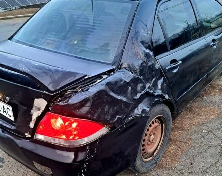 Чорний Міцубісі Lancer, об'ємом двигуна 1.6 л та пробігом 297 тис. км за 2100 $, фото 4 на Automoto.ua