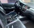 Чорний Міцубісі Lancer, об'ємом двигуна 1.6 л та пробігом 305 тис. км за 2950 $, фото 5 на Automoto.ua