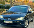 Міцубісі Lancer 2006 у Дніпро (Дніпропетровську) на Automoto.ua Чорний Міцубісі Lancer, об'ємом двигуна 2 л та пробігом 230 тис. км за 4900 $, фото 1 на Automoto.ua