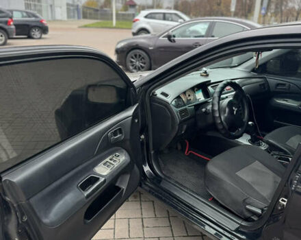 Черный Мицубиси Лансер, объемом двигателя 1.58 л и пробегом 370 тыс. км за 3500 $, фото 6 на Automoto.ua