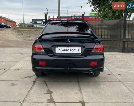 Чорний Міцубісі Lancer, об'ємом двигуна 2 л та пробігом 248 тис. км за 4990 $, фото 5 на Automoto.ua