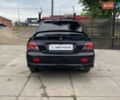 Чорний Міцубісі Lancer, об'ємом двигуна 2 л та пробігом 248 тис. км за 4990 $, фото 5 на Automoto.ua