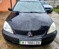 Чорний Міцубісі Lancer, об'ємом двигуна 1.6 л та пробігом 220 тис. км за 3700 $, фото 1 на Automoto.ua