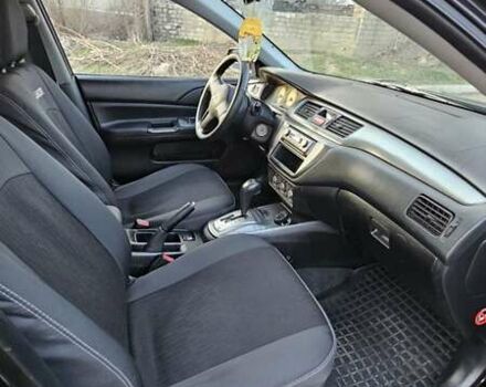 Чорний Міцубісі Lancer, об'ємом двигуна 1.6 л та пробігом 350 тис. км за 4950 $, фото 9 на Automoto.ua