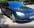 Черный Мицубиси Лансер, объемом двигателя 1.6 л и пробегом 238 тыс. км за 4300 $, фото 1 на Automoto.ua