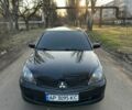 Чорний Міцубісі Lancer, об'ємом двигуна 2 л та пробігом 236 тис. км за 4500 $, фото 1 на Automoto.ua