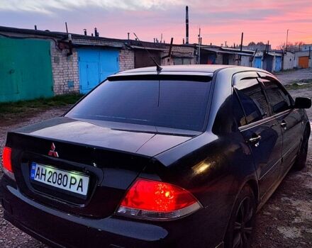 Чорний Міцубісі Lancer, об'ємом двигуна 1.6 л та пробігом 240 тис. км за 4000 $, фото 4 на Automoto.ua