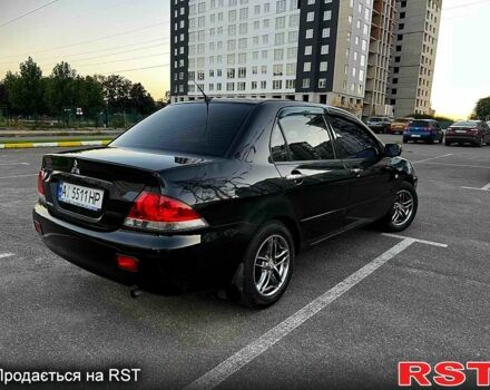 Чорний Міцубісі Lancer, об'ємом двигуна 1.6 л та пробігом 329 тис. км за 3500 $, фото 2 на Automoto.ua