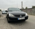 Чорний Міцубісі Lancer, об'ємом двигуна 1.58 л та пробігом 230 тис. км за 3350 $, фото 1 на Automoto.ua