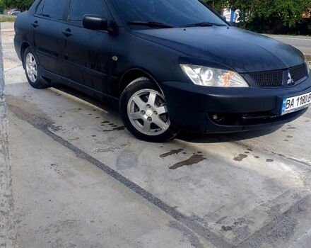 Чорний Міцубісі Lancer, об'ємом двигуна 1.6 л та пробігом 211 тис. км за 3500 $, фото 2 на Automoto.ua