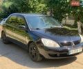 Черный Мицубиси Лансер, объемом двигателя 1.58 л и пробегом 362 тыс. км за 3700 $, фото 1 на Automoto.ua
