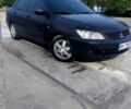 Чорний Міцубісі Lancer, об'ємом двигуна 1.6 л та пробігом 211 тис. км за 3500 $, фото 2 на Automoto.ua
