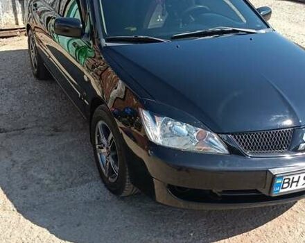 Черный Мицубиси Лансер, объемом двигателя 1.6 л и пробегом 257 тыс. км за 4500 $, фото 13 на Automoto.ua