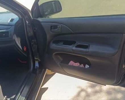 Чорний Міцубісі Lancer, об'ємом двигуна 1.6 л та пробігом 240 тис. км за 3900 $, фото 9 на Automoto.ua