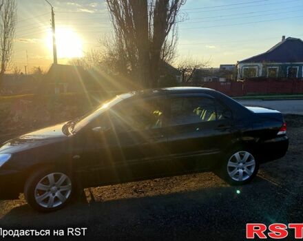 Чорний Міцубісі Lancer, об'ємом двигуна 1.6 л та пробігом 330 тис. км за 4500 $, фото 9 на Automoto.ua