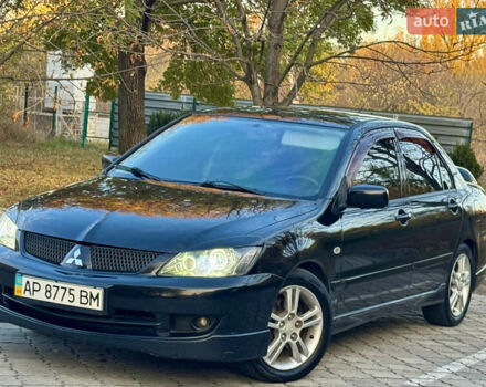 Міцубісі Lancer 2006 у Дніпро (Дніпропетровську) на Automoto.ua Чорний Міцубісі Lancer, об'ємом двигуна 2 л та пробігом 230 тис. км за 4900 $, фото 1 на Automoto.ua