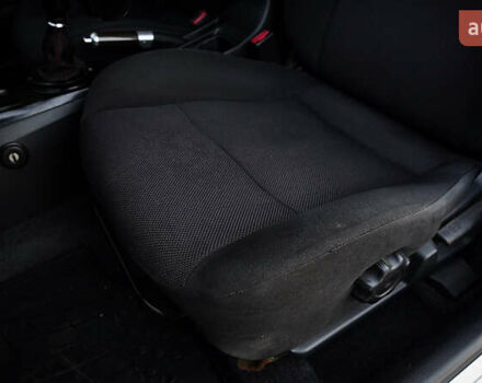 Черный Мицубиси Лансер, объемом двигателя 2 л и пробегом 253 тыс. км за 6900 $, фото 16 на Automoto.ua