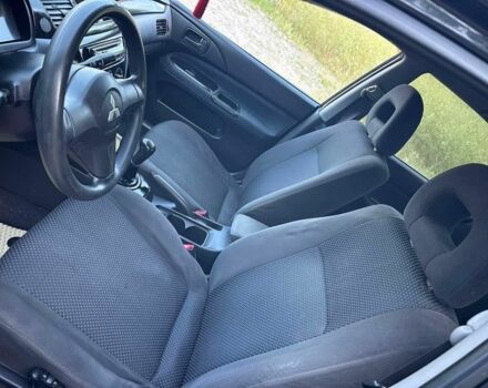 Черный Мицубиси Лансер, объемом двигателя 1.6 л и пробегом 289 тыс. км за 3200 $, фото 10 на Automoto.ua