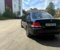 Черный Мицубиси Лансер, объемом двигателя 1.6 л и пробегом 0 тыс. км за 2850 $, фото 2 на Automoto.ua