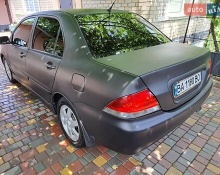 Чорний Міцубісі Lancer, об'ємом двигуна 1.58 л та пробігом 280 тис. км за 3950 $, фото 5 на Automoto.ua