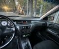 Черный Мицубиси Лансер, объемом двигателя 1.58 л и пробегом 230 тыс. км за 3800 $, фото 13 на Automoto.ua
