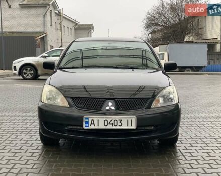 Чорний Міцубісі Lancer, об'ємом двигуна 1.58 л та пробігом 270 тис. км за 3950 $, фото 6 на Automoto.ua