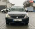 Чорний Міцубісі Lancer, об'ємом двигуна 1.58 л та пробігом 270 тис. км за 3950 $, фото 6 на Automoto.ua