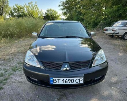 Черный Мицубиси Лансер, объемом двигателя 1.6 л и пробегом 289 тыс. км за 3200 $, фото 2 на Automoto.ua