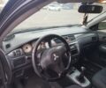 Черный Мицубиси Лансер, объемом двигателя 1.6 л и пробегом 290 тыс. км за 3200 $, фото 5 на Automoto.ua