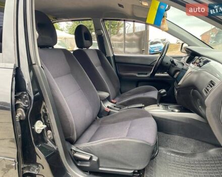 Чорний Міцубісі Lancer, об'ємом двигуна 2 л та пробігом 248 тис. км за 4990 $, фото 11 на Automoto.ua