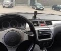Черный Мицубиси Лансер, объемом двигателя 2 л и пробегом 181 тыс. км за 5500 $, фото 16 на Automoto.ua