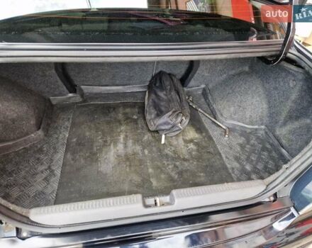 Черный Мицубиси Лансер, объемом двигателя 2 л и пробегом 168 тыс. км за 4999 $, фото 19 на Automoto.ua