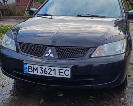 Чорний Міцубісі Lancer, об'ємом двигуна 1.6 л та пробігом 250 тис. км за 4000 $, фото 1 на Automoto.ua