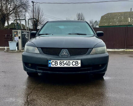 Чорний Міцубісі Lancer, об'ємом двигуна 1.59 л та пробігом 305 тис. км за 2950 $, фото 12 на Automoto.ua