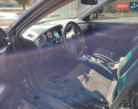 Черный Мицубиси Лансер, объемом двигателя 1.58 л и пробегом 128 тыс. км за 4600 $, фото 23 на Automoto.ua