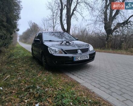 Черный Мицубиси Лансер, объемом двигателя 1.58 л и пробегом 246 тыс. км за 4200 $, фото 17 на Automoto.ua
