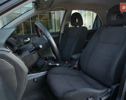 Черный Мицубиси Лансер, объемом двигателя 2 л и пробегом 253 тыс. км за 6900 $, фото 15 на Automoto.ua