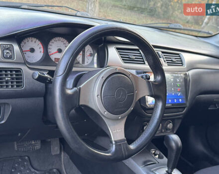 Міцубісі Lancer 2006 у Дніпро (Дніпропетровську) на Automoto.ua Чорний Міцубісі Lancer, об'ємом двигуна 2 л та пробігом 230 тис. км за 4900 $, фото 17 на Automoto.ua