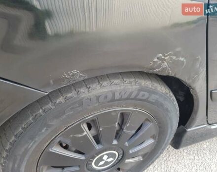 Чорний Міцубісі Lancer, об'ємом двигуна 1.58 л та пробігом 290 тис. км за 3200 $, фото 20 на Automoto.ua
