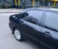 Чорний Міцубісі Lancer, об'ємом двигуна 1.6 л та пробігом 218 тис. км за 4300 $, фото 4 на Automoto.ua